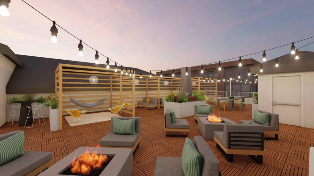 Outdoor rooftop lounge with string lights, firepits, hammocks, and lounge areas
