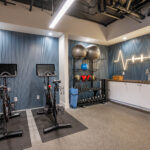 Fitness center with cardio and bodyweight exercise equipment