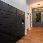 Elevator lobby with mailboxes and Luxer package lockers