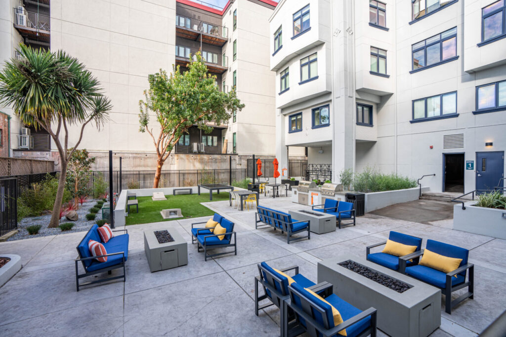 Courtyard firepits, cornhole, ping pong table, and more in Berkeley, California.
